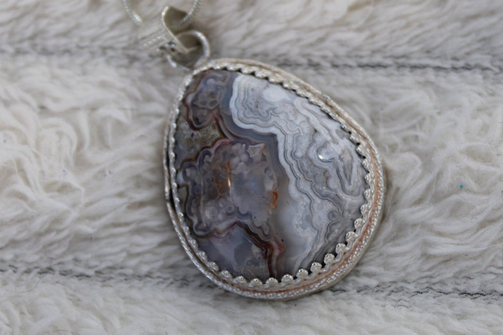 Crazy Lace Agate Pear Shaped Pendant with Elegant Sterling Silver Adornments, Artisan One-of-a-kind to promote joy and help with anxiety