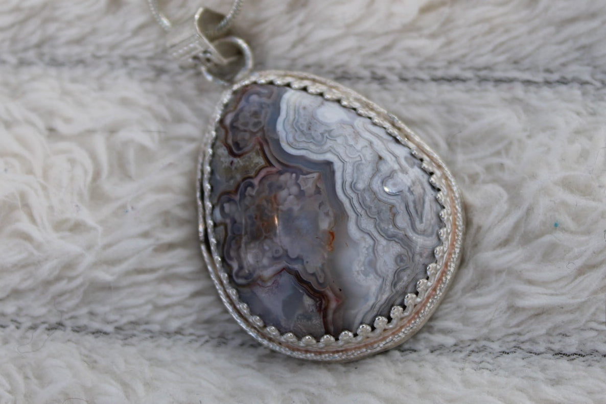 Crazy Lace Agate Pear Shaped Pendant with Elegant Sterling Silver Adornments, Artisan One-of-a-kind to promote joy and help with anxiety