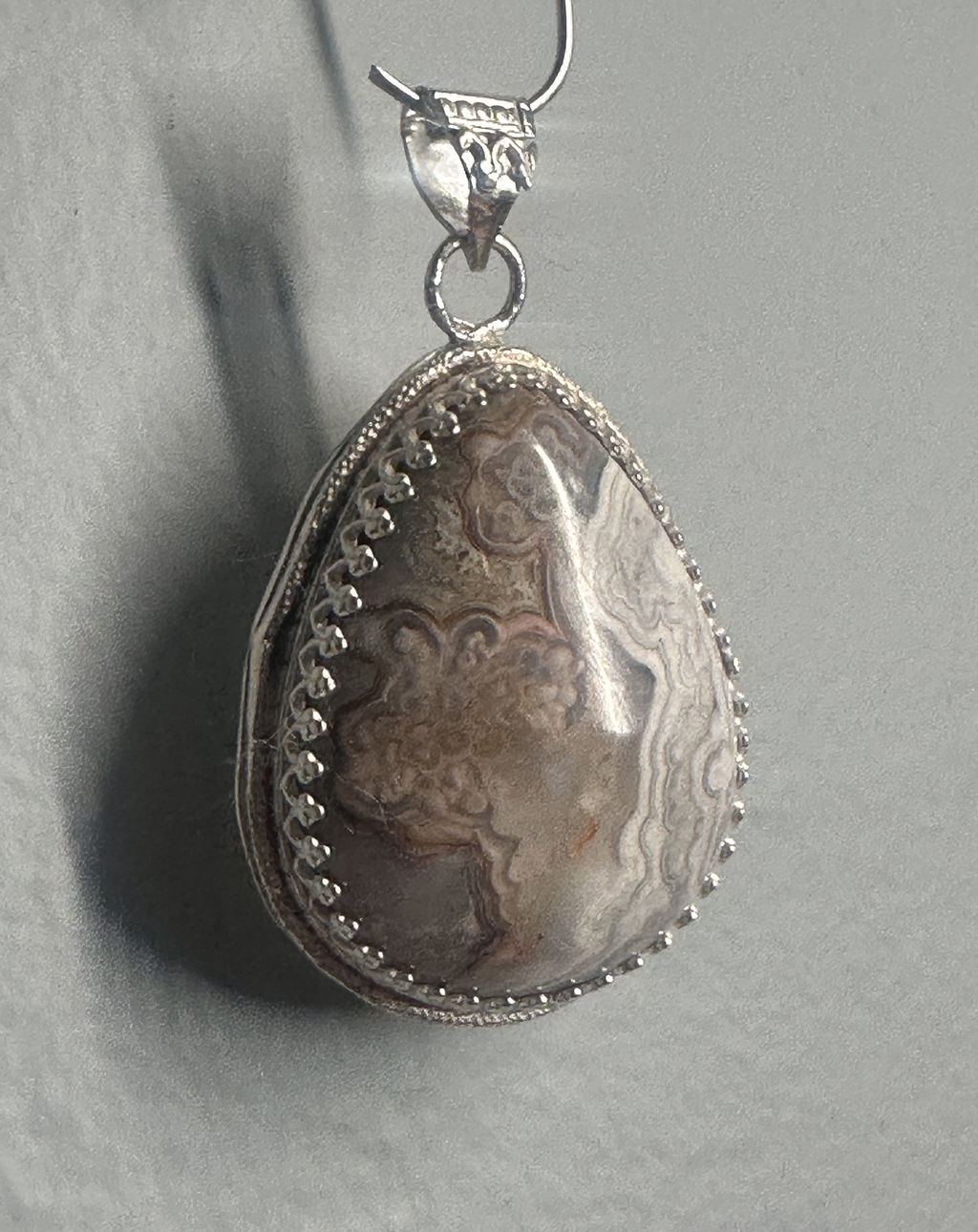 Crazy Lace Agate Pear Shaped Pendant with Elegant Sterling Silver Adornments, Artisan One-of-a-kind to promote joy and help with anxiety