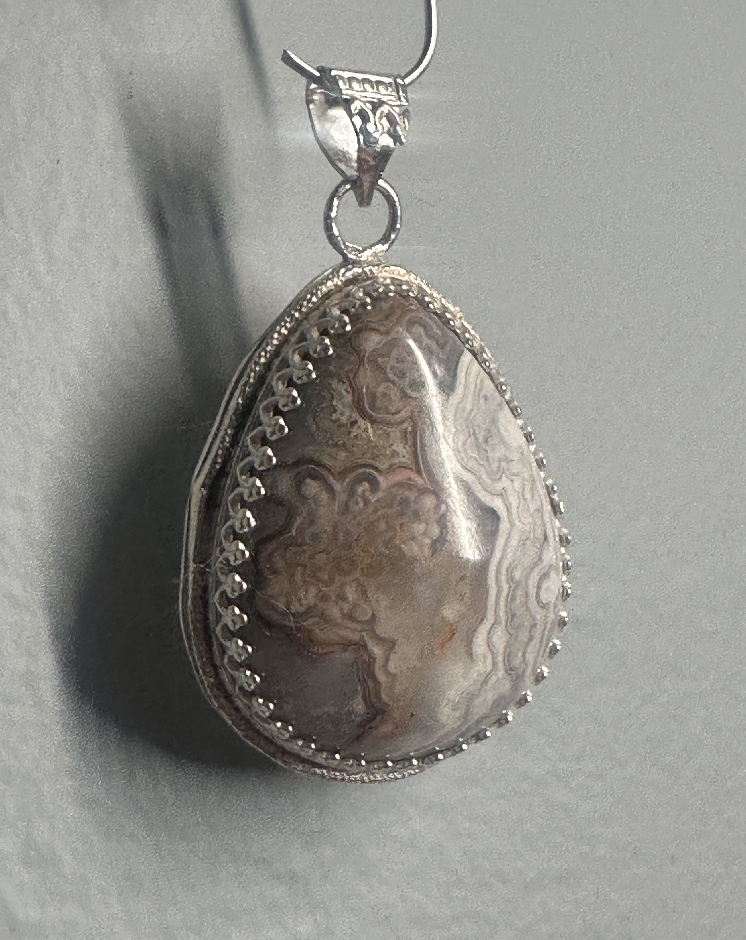 Crazy Lace Agate Pear Shaped Pendant with Elegant Sterling Silver Adornments, Artisan One-of-a-kind to promote joy and help with anxiety