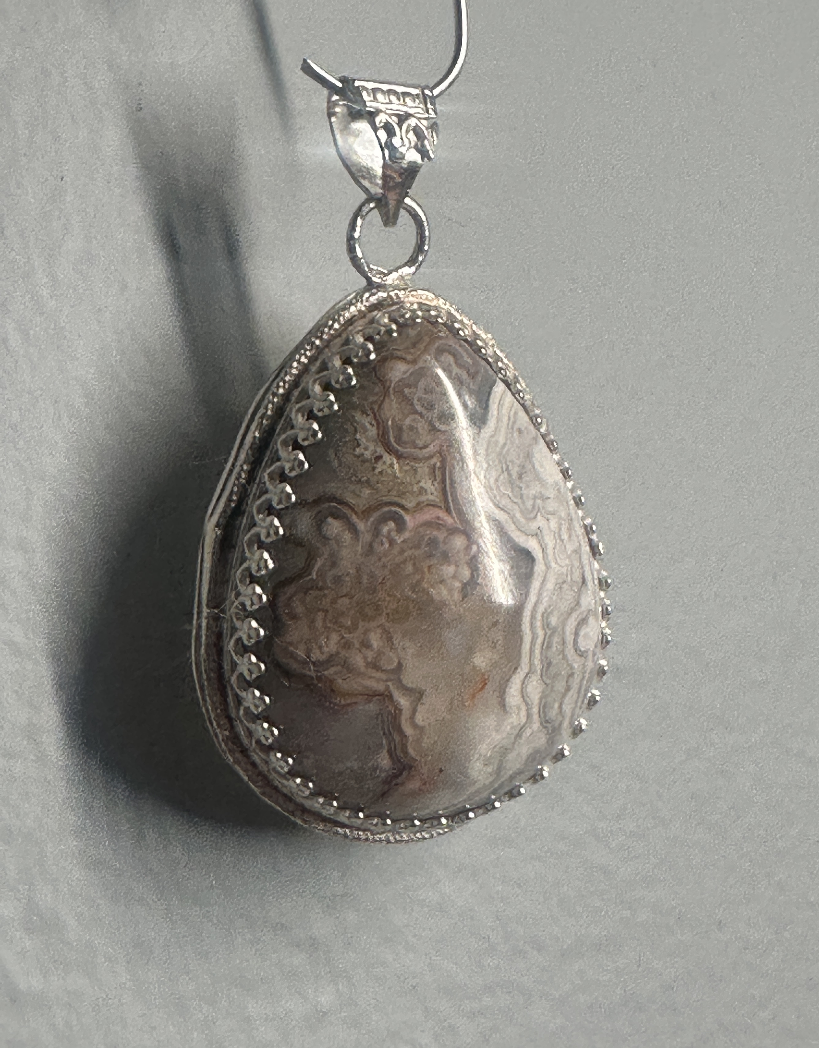 Crazy Lace Agate Pear Shaped Pendant with Elegant Sterling Silver Adornments, Artisan One-of-a-kind to promote joy and help with anxiety