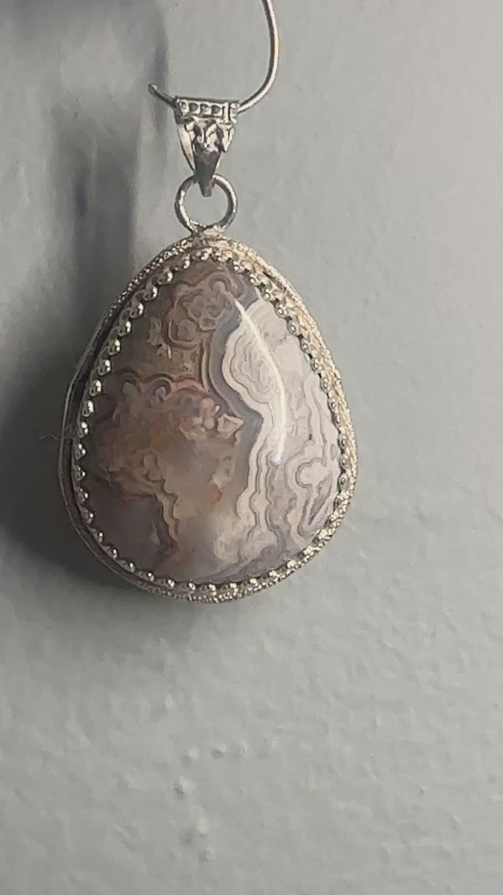 Crazy Lace Agate Pear Shaped Pendant with Elegant Sterling Silver Adornments, Artisan One-of-a-kind to promote joy and help with anxiety